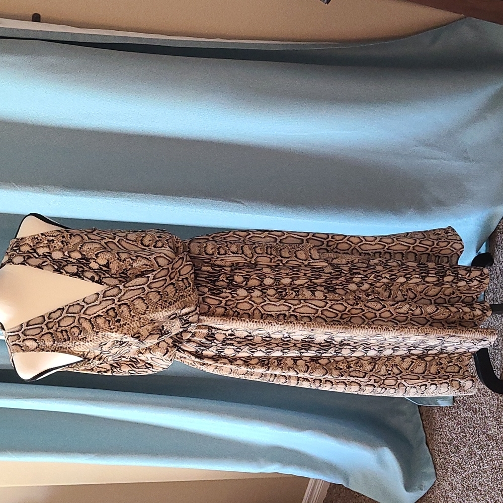 Cute mid calf pant romper.